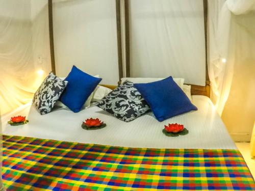 Una cama o camas en una habitación de Wijenayake's - Beach Haven Guest House - Galle Fort