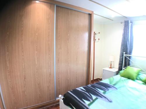 Una cama o camas en una habitación de Apartamentos Club del Mar San Juan Beach