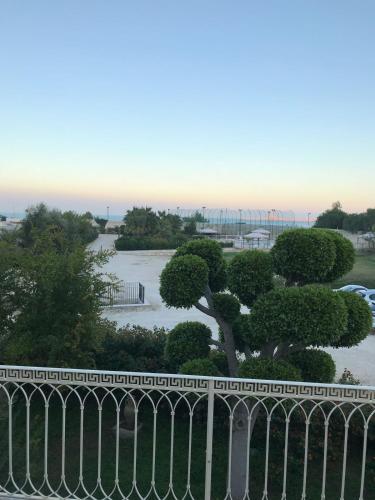 a view of a park behind a fence at Hotel Boutique Il Castellino Relais in Vieste