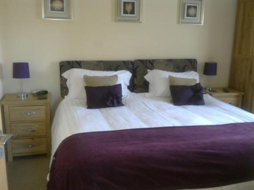 Ένα ή περισσότερα κρεβάτια σε δωμάτιο στο Ashberry Guest House