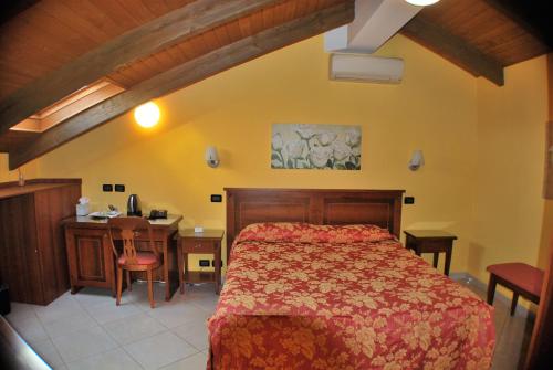 Postel nebo postele na pokoji v ubytování Hotel Belvedere