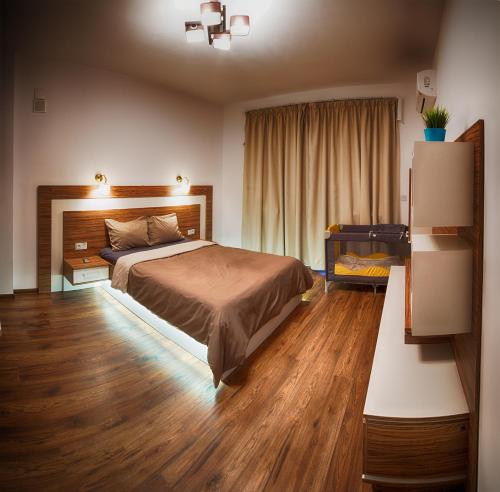 เตียงในห้องที่ Sunshine Sofia