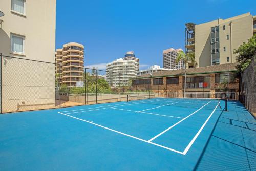 a tennis court in the middle of a city at Wharf Boutique Apartments in Gold Coast