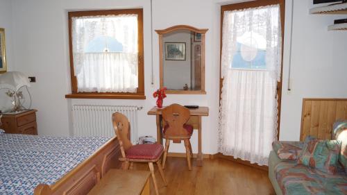 Katil atau katil-katil dalam bilik di B&B L'Arca di Noè