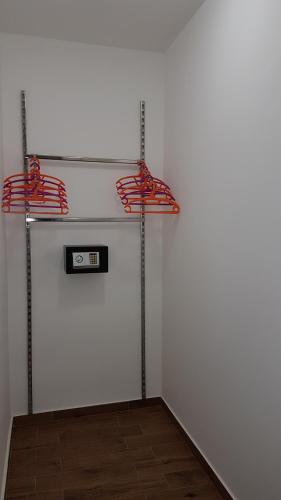 a room with two shelves in a white wall at B&B Stella Maris Sciacca Centro in Sciacca