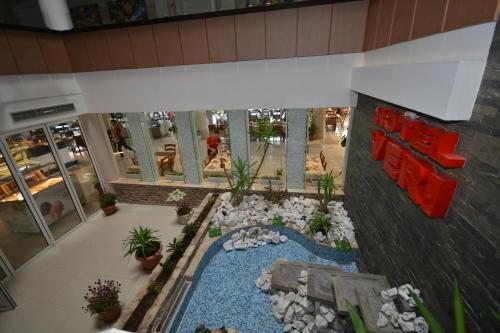 an overhead view of a lobby with a pool in a building at Hotel Veri in Peshkopi