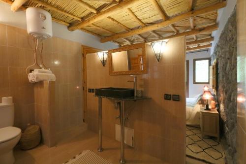 Kylpyhuone majoituspaikassa Hiba Lodge