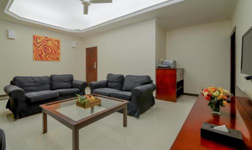 Ruang duduk di Tanzanite Executive Suites