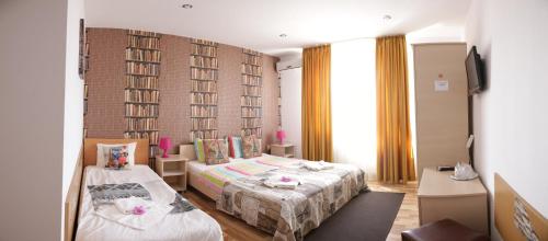 Ένα ή περισσότερα κρεβάτια σε δωμάτιο στο City Comfort Villa