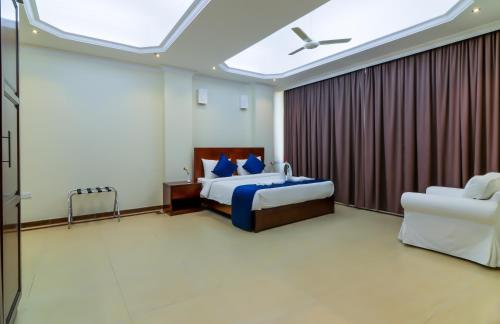 Katil atau katil-katil dalam bilik di Tanzanite Executive Suites
