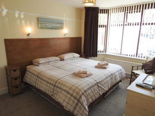 Katil atau katil-katil dalam bilik di Cherish End Guest House