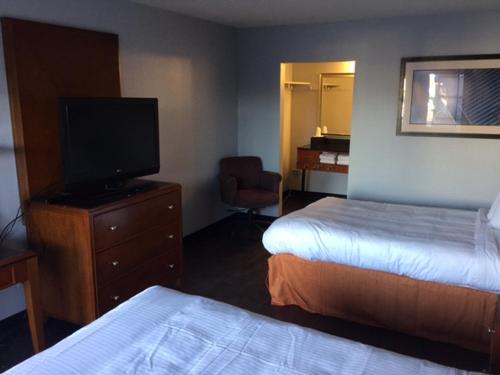 Postel nebo postele na pokoji v ubytování Extend-a-Suites Phoenix