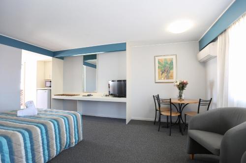 Kuchyň nebo kuchyňský kout v ubytování Reef Resort Motel