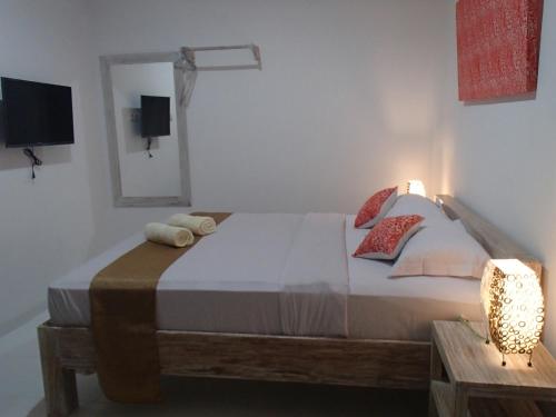 Katil atau katil-katil dalam bilik di Askara Guest House & Hostel