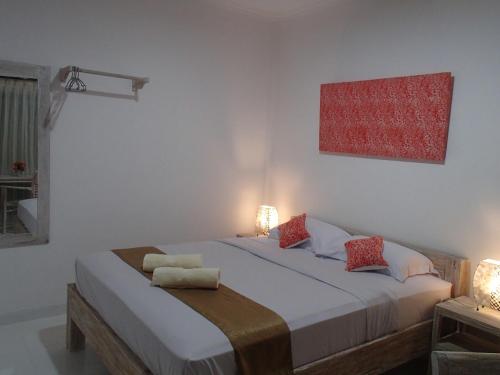 Katil atau katil-katil dalam bilik di Askara Guest House & Hostel
