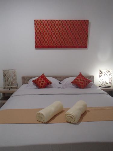 Katil atau katil-katil dalam bilik di Askara Guest House & Hostel