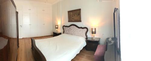 Ένα ή περισσότερα κρεβάτια σε δωμάτιο στο Apartment near the Beach