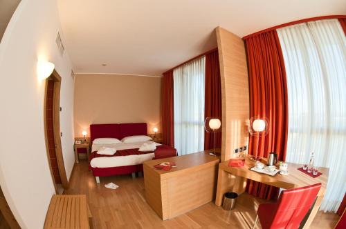 מיטה או מיטות בחדר ב-Hotel Remilia