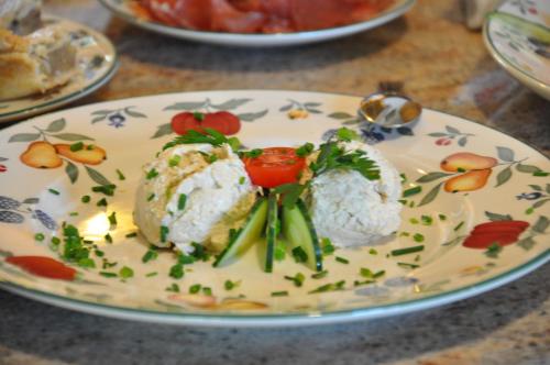 a plate of food on a table at Gmiatliche Stubm in Loipersdorf bei Fürstenfeld