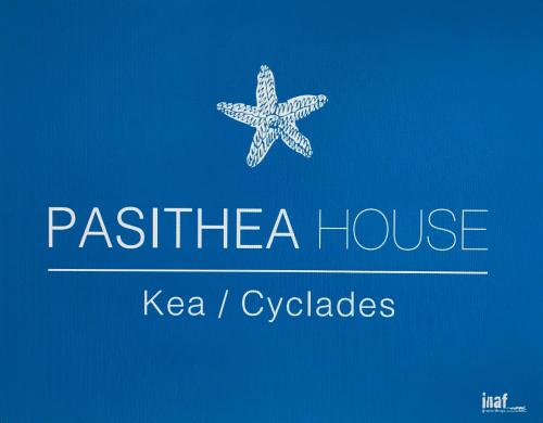 a sign for a restaurant with a starfish at Pasithea House in Ioulis
