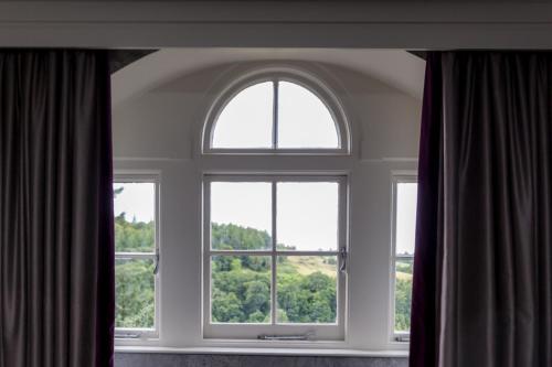 a window that is open in a room at The Dowans Hotel of Speyside in Aberlour