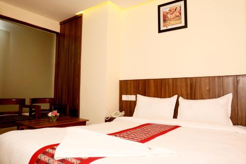 Hotel Kathmandu Innにあるベッド