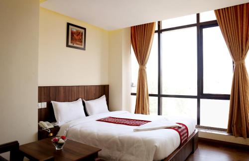Hotel Kathmandu Innにあるベッド