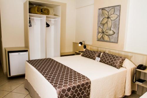 Postel nebo postele na pokoji v ubytování Hotel Binder Quality Inn