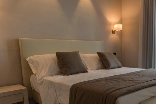 Letto o letti in una camera di Hotel Villa Barsanti