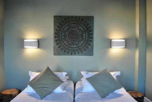 Cama ou camas em um quarto em Guest House Santa Clara
