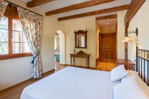 Lova arba lovos apgyvendinimo įstaigoje Hotel Rural Las Gacelas