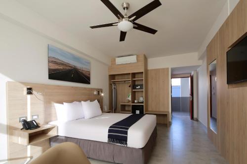 Ένα ή περισσότερα κρεβάτια σε δωμάτιο στο Casa Andina Select Moquegua