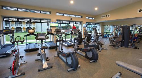 a gym with a bunch of exercise bikes and treadms at Bucuti & Tara Boutique Beach Resort - Adult Only in Palm-Eagle Beach