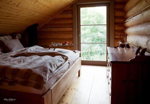 Ένα ή περισσότερα κρεβάτια σε δωμάτιο στο Srub Bublava 806