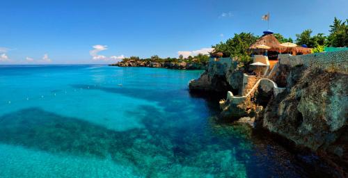 a view of the ocean from a cliff at The Caves in Negril