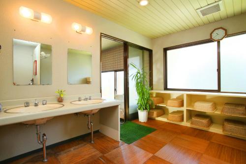 Ένα μπάνιο στο Hotel Silk Inn Madarao