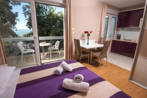 Postel nebo postele na pokoji v ubytování Apartments Vlasic