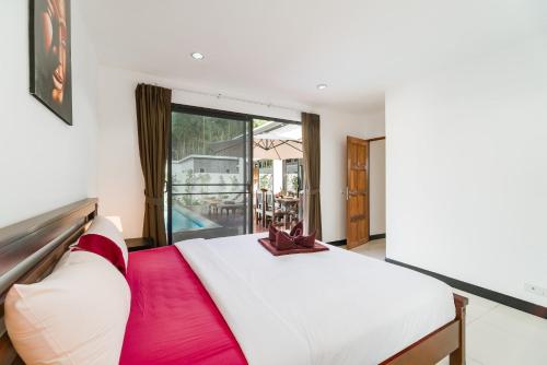 Ένα ή περισσότερα κρεβάτια σε δωμάτιο στο Villas Eden