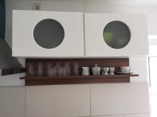 Kuchyň nebo kuchyňský kout v ubytování Apartment Fabio