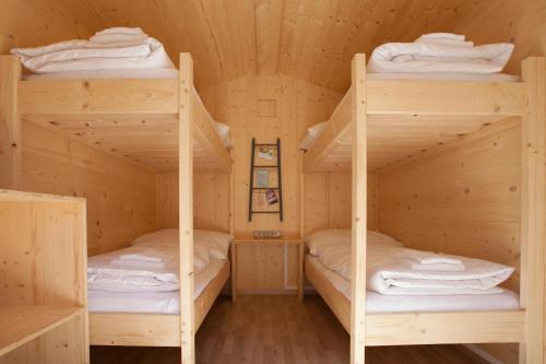 Ein Bett oder Betten in einem Zimmer der Unterkunft Life Camp