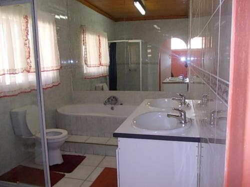 A bathroom at All Are Welcome Guest House