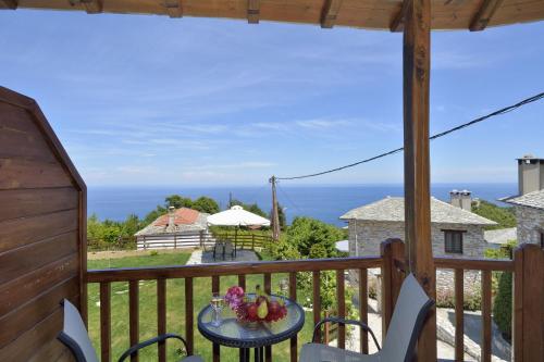 a view of the ocean from the balcony of a house at Mple Feggari in Mouresi