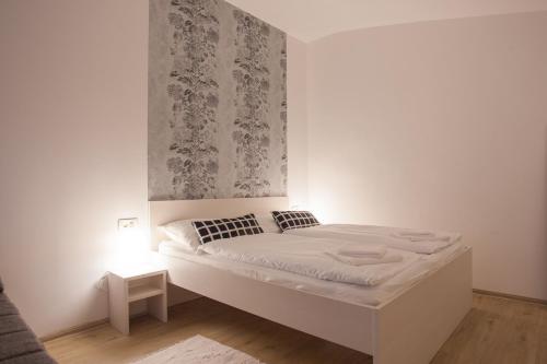 Postel nebo postele na pokoji v ubytování Apartments SHISHKA