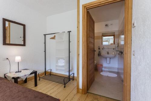 a bathroom with a shower and a toilet in a room at Agriturismo Cascina Cornella in Cremeno