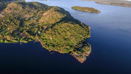 an aerial view of an island in the water at Wag Hill Lodge & Spa in Mwanza