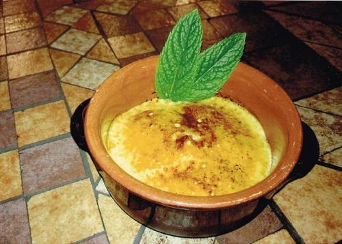 a bowl of food with a green leaf on top at Camping Roma in Ventimiglia