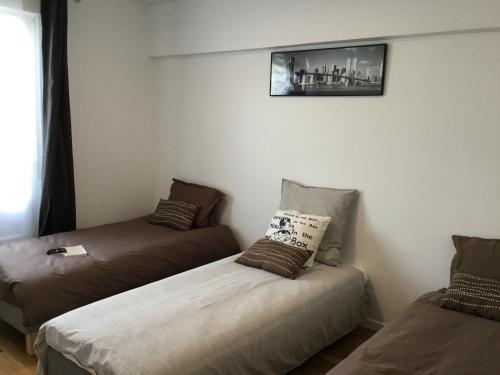 Кровать или кровати в номере chambre d'hôte-abc