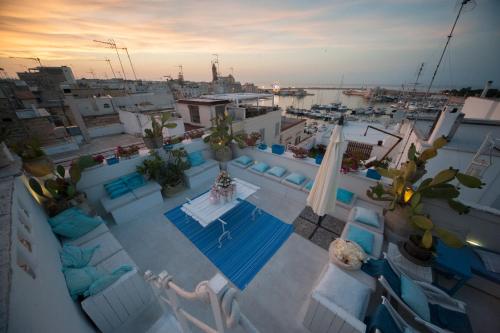 an overhead view of a swimming pool on a rooftop at Portadamare in Trani