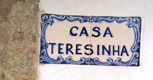 a sign on a wall that reads casa teresilia at Casa D Obidos in Óbidos