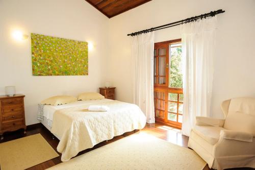 En eller flere senge i et værelse på Locanda Buona Fortuna